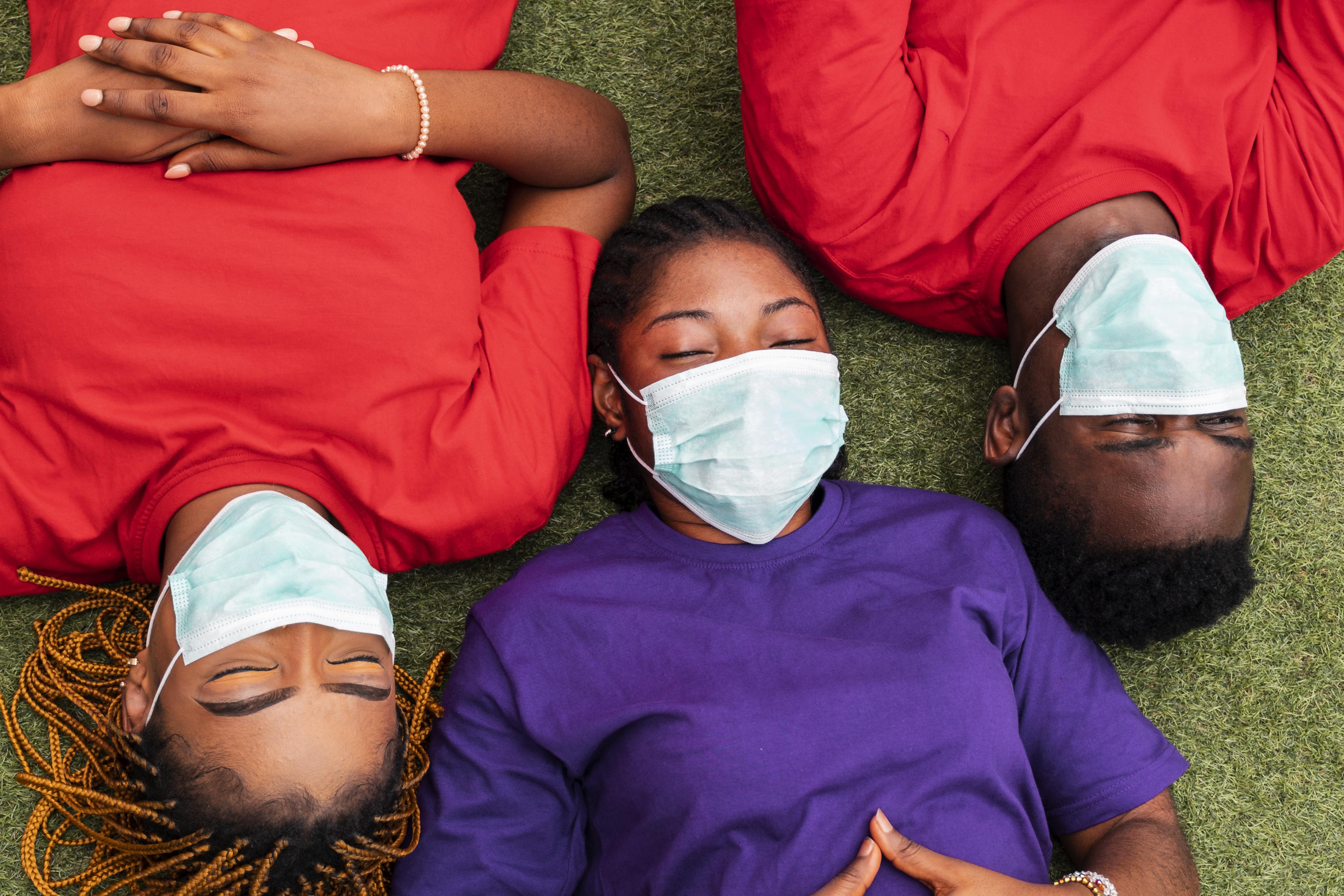 Young people standing together during a health campaign